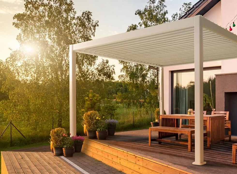 An aluminium Pergola in a sunset garden, surrounded by trees and wild life.
