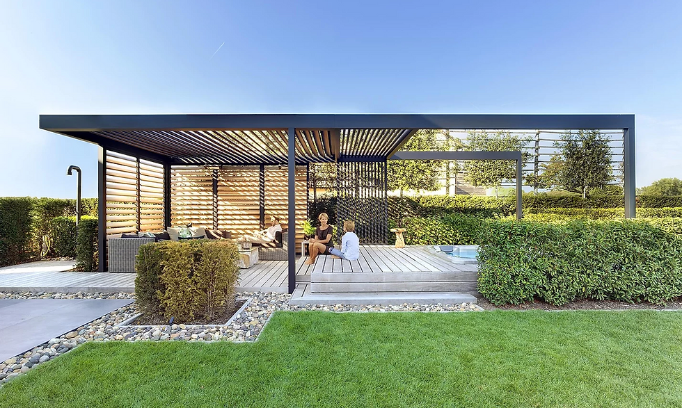 A mother and son sitting under a Pergola in a garden, enjoying the outdoors.